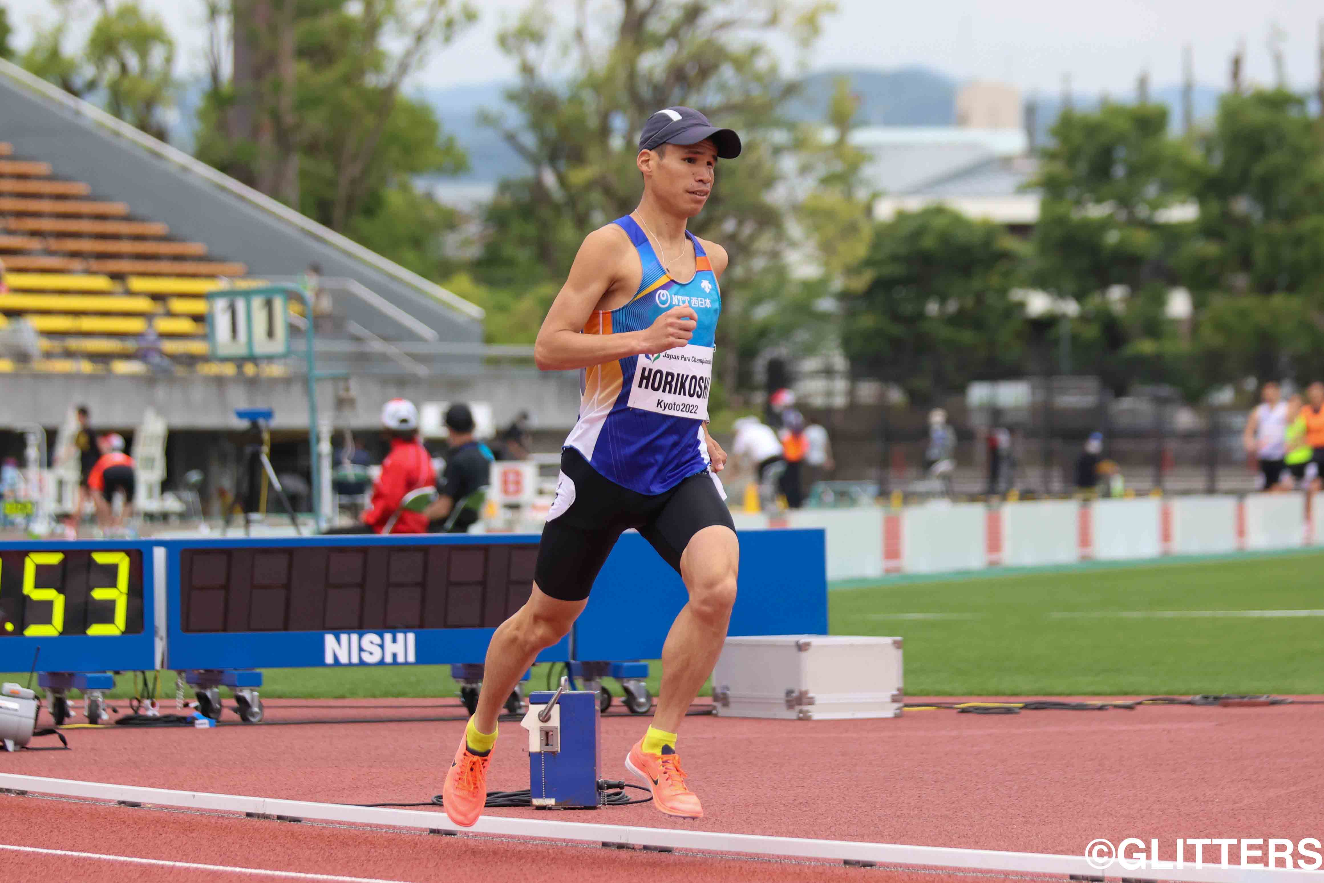 T12男子5000mで自身の持つ大会新記録を塗り替えた堀越信司 | 道下、堀越が貫禄の走り　跳躍は「チーム力」で躍進に挑む -ジャパンパラ陸上競技大会2日目-
｜2022ジャパンパラ陸上競技大会【2日目】 | Glitters 障害者スポーツ専門ニュースメディア